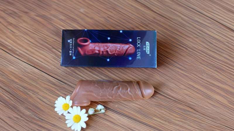 Bộ sản phẩm bao cao su đôn dên Lock love có quai đeo Bộ sản phẩm bao cao su đôn dên Lock love có quai đeo